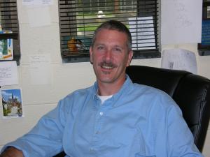 tom hagan at his desk