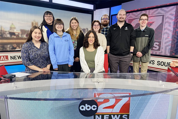 students at news station