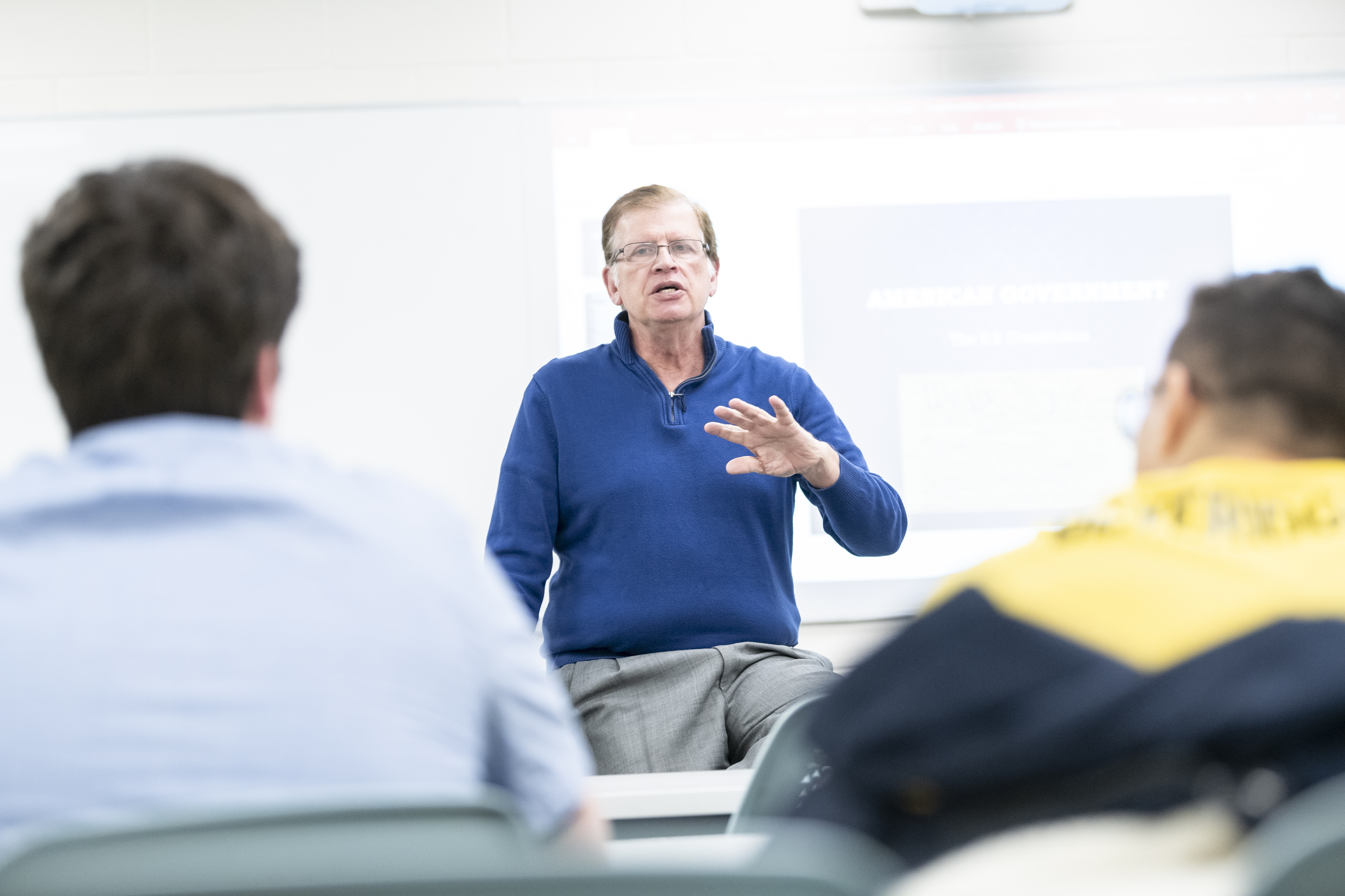Political Science professor Fletche McClellan teaches a course.