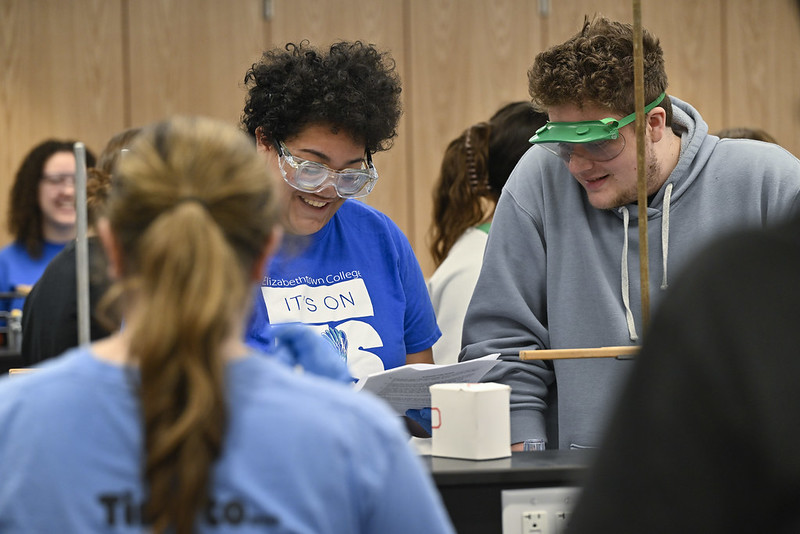 students with beakers